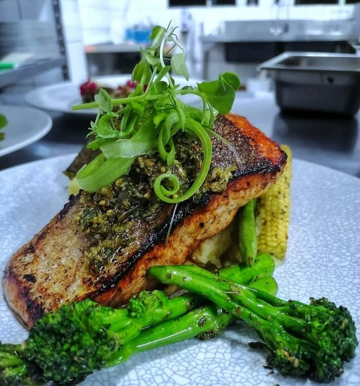 Pan-seared salmon plated by Lapeng Gourmet Caterers